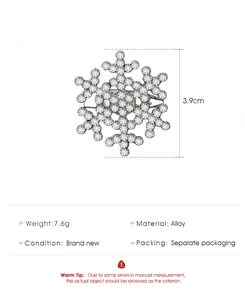 Macro detail of snowflake brooch showing 3.9cm size and silver alloy rhinestone settings