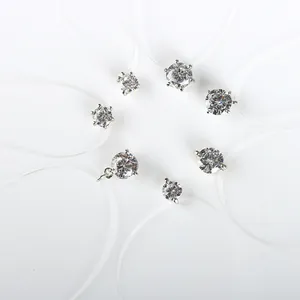 Elegant fishing line necklace with multi-size round cubic zirconia stones in silver claw settings