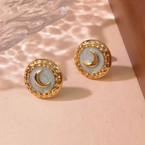 Golden stainless steel earrings with light blue enamel and crescent moon pattern