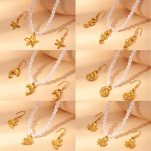 Ozean-Perlenhalskette-Set mit goldenen Delfin- und Seestern-Anhängern für den Strand