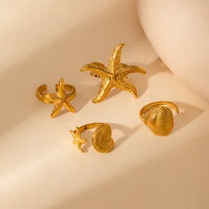 Adjustable gold starfish and seashell rings set in stainless steel for women