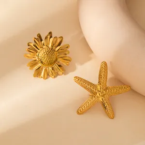 Golden stainless steel sunflower and starfish open rings with textured matte finish