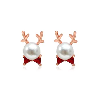 Rose gold reindeer stud earrings with white pearl and red zircon bowknot detail