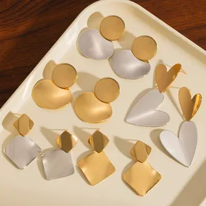 Exaggerated two-tone geometric stainless steel earrings with gold and silver heart designs