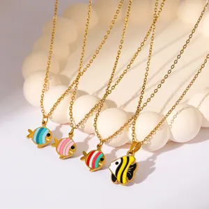 Golden stainless steel tropical fish necklaces with colorful enamel pendants on white spheres