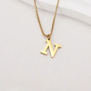 Gold-plated stainless steel necklace featuring a polished uppercase letter N pendant