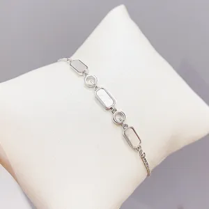 Bracelet ajustable en argent avec panneaux nacre et maillons circulaires G iconiques