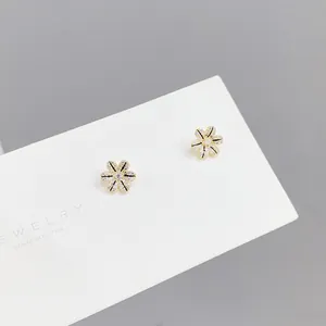 Elegant s925 silver petal stud earrings set with white zircon and gold finish