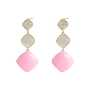 Long S925 silver needle earrings with pink enamel rhombuses and cat eye stones