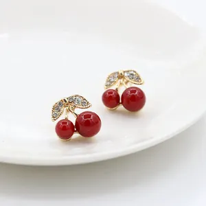 Chic red cherry stud earrings with gold leaves and sparkling rhinestones for women