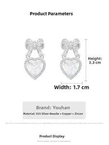 Tabella taglie dettagliata per orecchini a fiocco e cuore con misure 3,3 cm per 1,7 cm