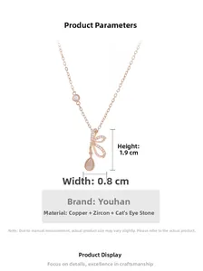 Detail showing dimensions of rose gold bow necklace with cat-eye stone and zircons