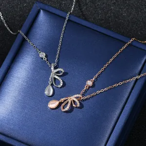 Elegant Copper Bowknot Pendant Necklace Real Gold Plated with Drop Shaped Cat Eye Stone Micro Pave Zirconia Jewelry for Women Gift