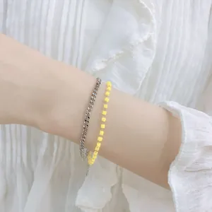 Bracciale a doppio strato con catena cubana argento e perline quadrate gialle
