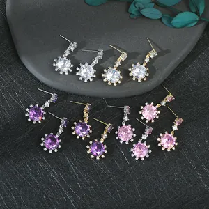 Élégantes boucles d'oreilles flocon de neige en or et argent avec cristaux colorés