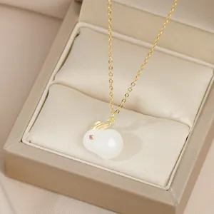 Elegant gold plated rabbit pendant necklace with white faux jade and pink zircon accent