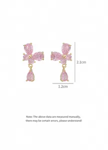 Detail view of pink butterfly drop earrings with cubic zirconia stones and 2.1cm height