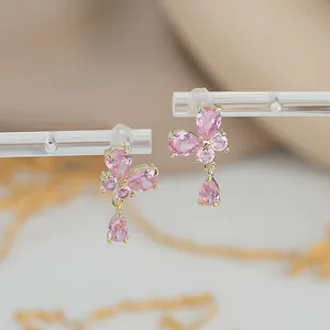 Elegant pink butterfly drop earrings with zircon crystals and gold-plated settings