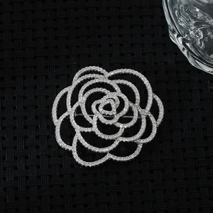Elegant silver hollow rose brooch with white crystals for luxury suit accessories