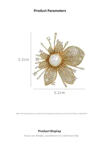 Detailed view of gold flower brooch with pearl and zircons, size 5.2cm x 5.2cm