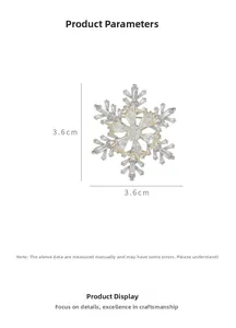 Vue détaillée d'une broche flocon tournante avec zircons et dimensions de 3,6 cm