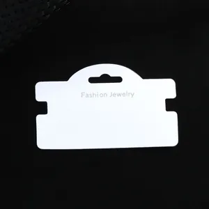 White jewelry display card for earrings and necklaces with a central fashion jewelry logo