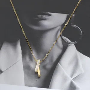Vergoldete Halskette mit X-Anhänger und mikrogefassten Zirkonia-Kristallen für Damen