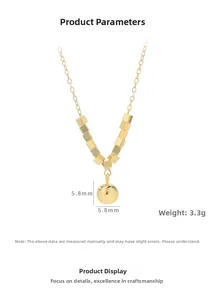 Detail van vergulde V-vormige hanger met 5,8 mm ronde kraal aan minimalistische ketting