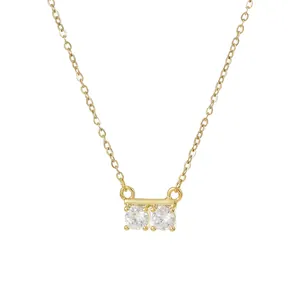 Minimalist gold-plated necklace featuring double round cubic zirconia stone pendants