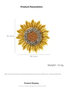 Detail view of gold-plated sunflower brooch with rhinestone core, size 38.2mm, weight 14.5g