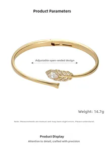 Macro detail of gold plated feather bangle featuring micro-set zircon and 14.7g weight