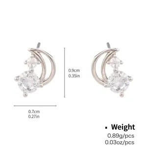 Macro detail of moon stud earrings with dimensions and weight in silver finish
