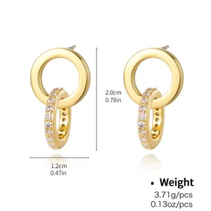 Macro shot of gold double-hoop earrings with sparkling cubic zirconia and dimensions