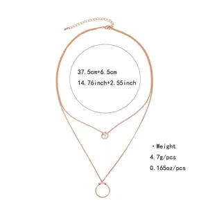Collier double couche minimaliste en laiton doré avec pendentif en zircone cubique