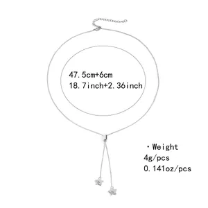 Détail du collier double étoile en laiton argenté avec zircons et chaîne d'extension