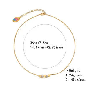 Detail view of gold necklace with heart charms, 36cm length and butterfly tag