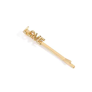 Elegant gold-plated LOVE letter bobby pin with a polished mirror finish for women