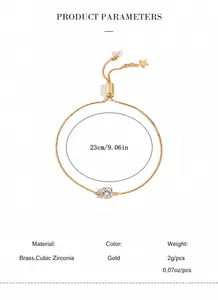 Detail of adjustable gold brass bracelet with cubic zircon and star charm, 23cm length
