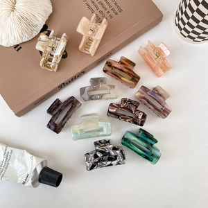 Set of 11 minimalist acetate hair claws with marble and tortoiseshell patterns
