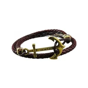 Detail of dark brown braided leather bracelet with bronze anchor clasp and engraving