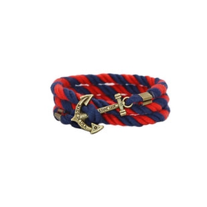 Close-up of nautical rope bracelet featuring a brass anchor clasp with engraved text