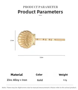 Détail d'une pince à cheveux coquillage dorée de 5,5cm avec dimensions et infos matériau