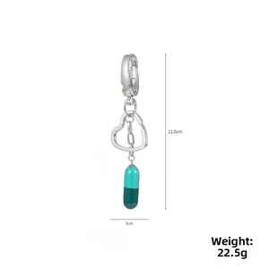 Detail view of bicolor capsule keychain showing 11.6cm length and 22.5g weight