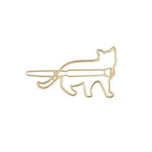 Pince à cheveux minimaliste en métal doré avec une silhouette de chat évidée élégante