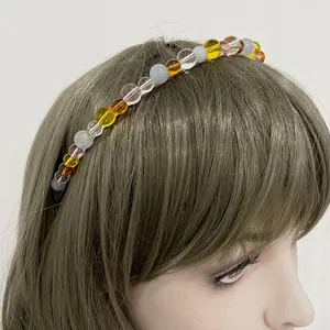 Colorful beaded headband for women featuring vibrant glass beads and a slim metal frame