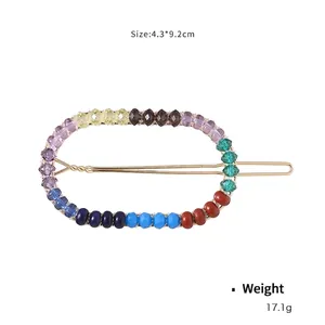 Colorful beaded hair clip with gold metal base for beach travel and summer accessories