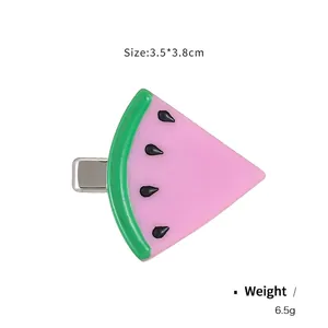 Cute resin watermelon slice hair clip for summer, featuring pink fruit and green rind