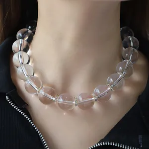 Collar de cuentas de acrílico transparente con espaciadores dorados de diamantes