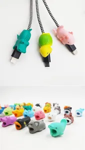 Close-up of colorful animal cable bites including crocodile and shark for cable protection