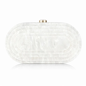 Detail of white marble acrylic evening clutch with tiered oval design and gold clasp